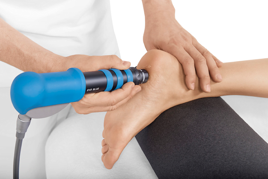 Shockwave therapy applicator used over the heel and foot area