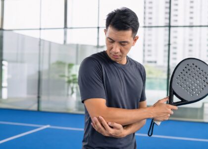 Malaysian recreational padel player with outer elbow pain after racket sport